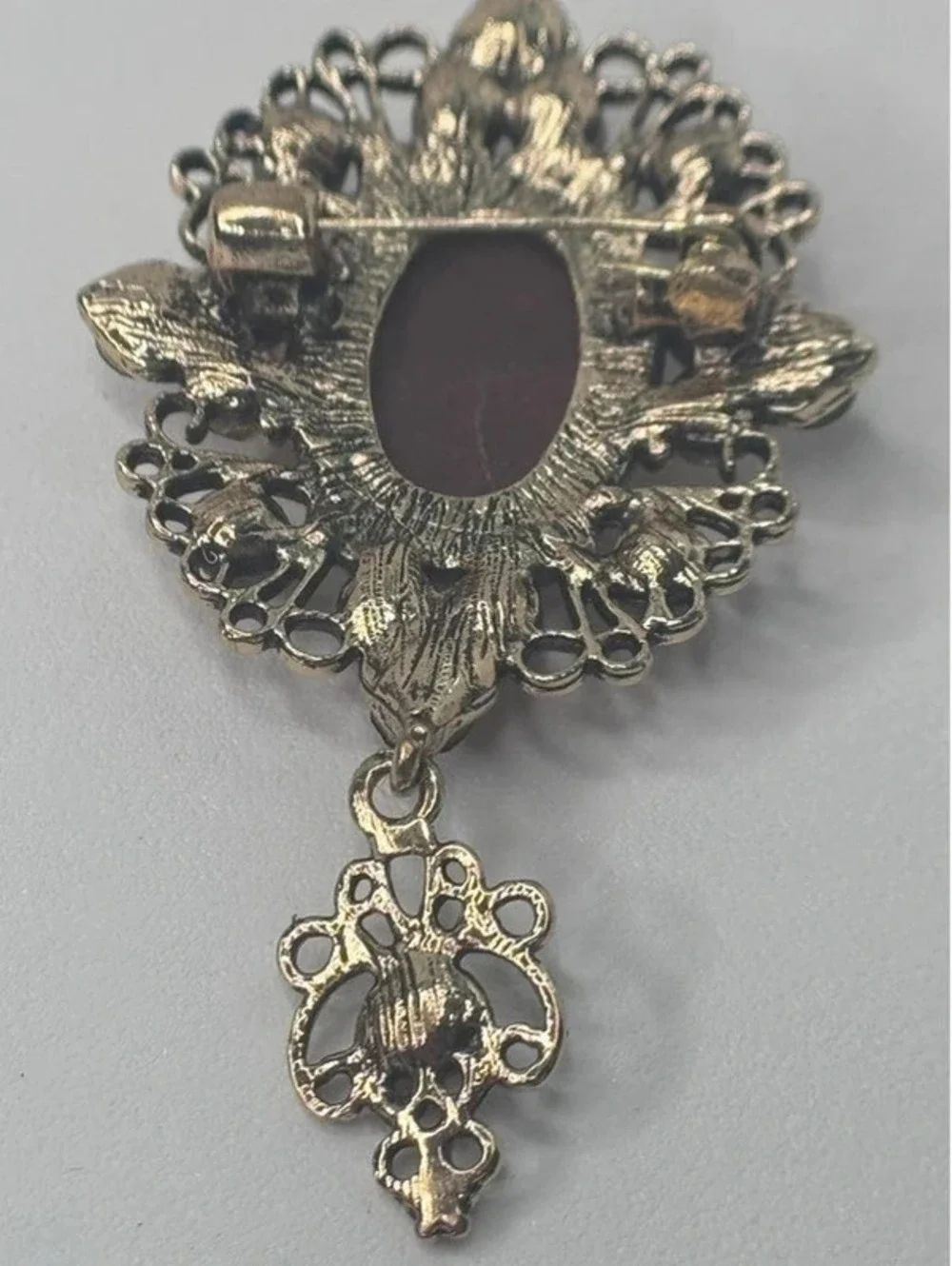 Victorian Revival cameo style brooch rhinestone dangle ornate gold tone pin